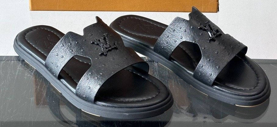 Louis Vuitton Black Embossed Slide Sandals — front
