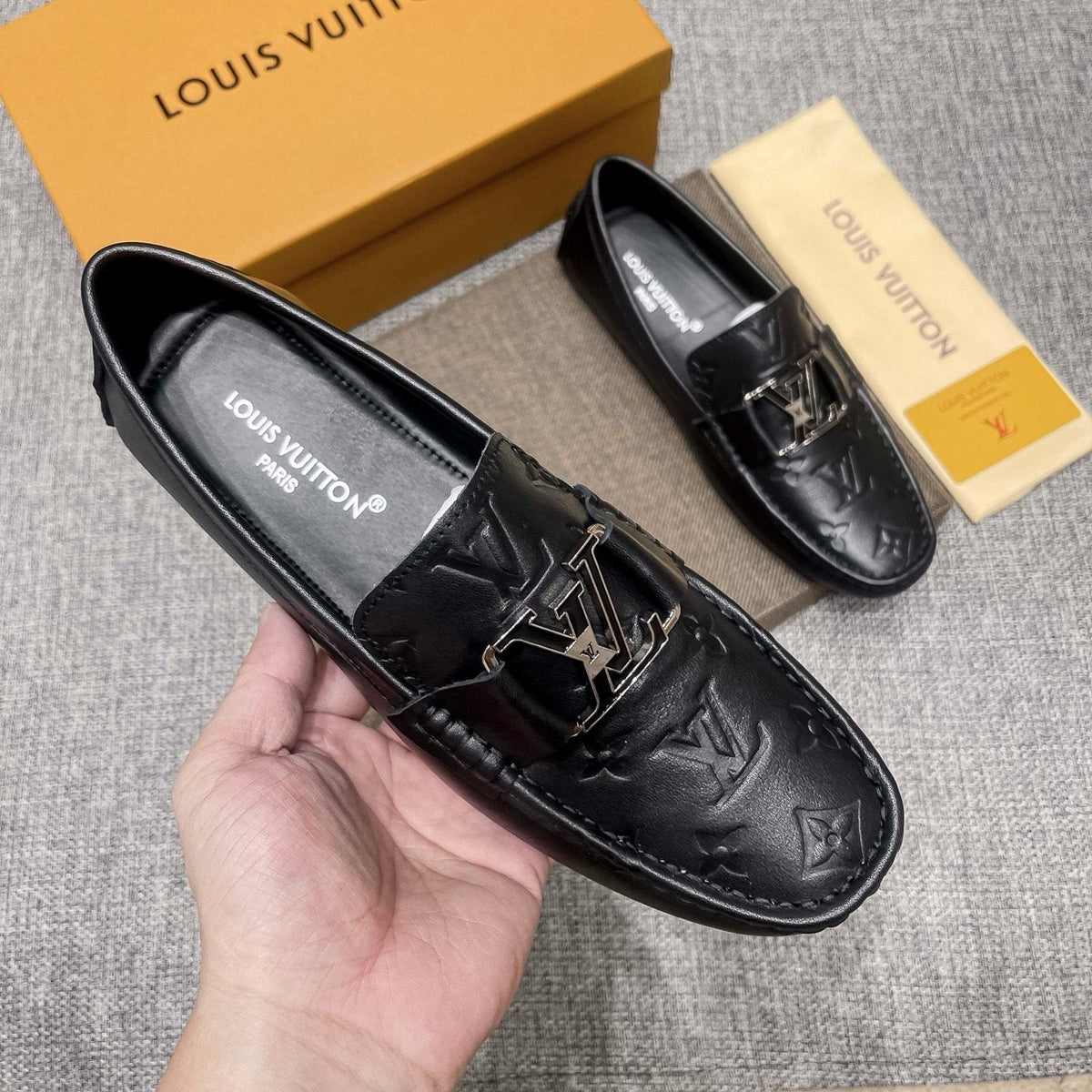 Louis Vuitton Black Metal-Accent Loafers — model