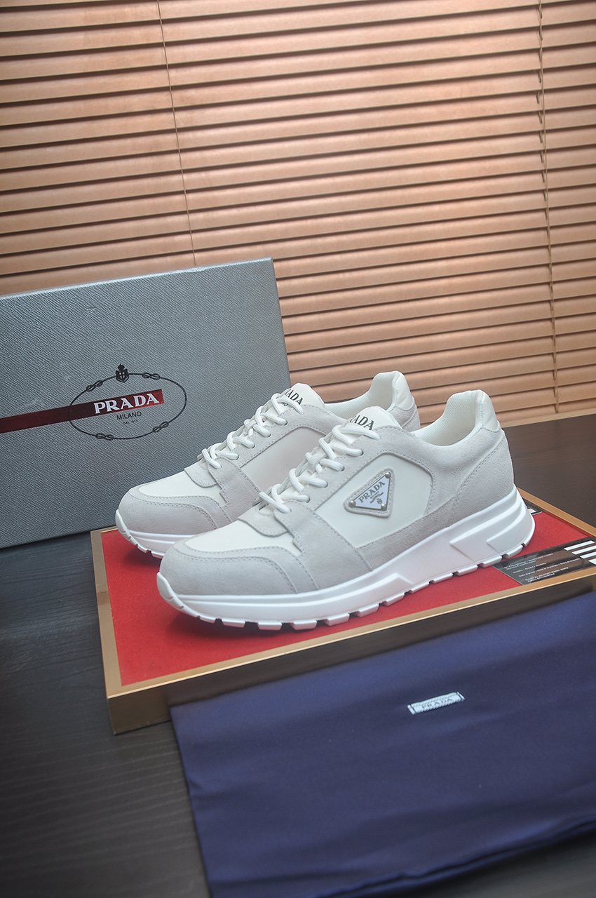 Prada Triangle Plaque Low-Top Sneakers — front
